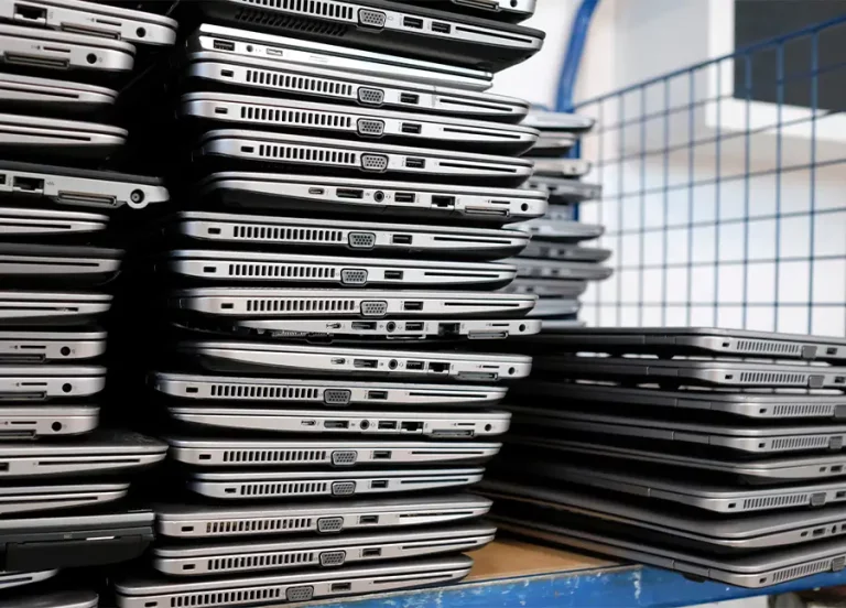 Stack of laptops ready for data destruction and recycling by Great Chesapeake IT Recycling and Data Destruction